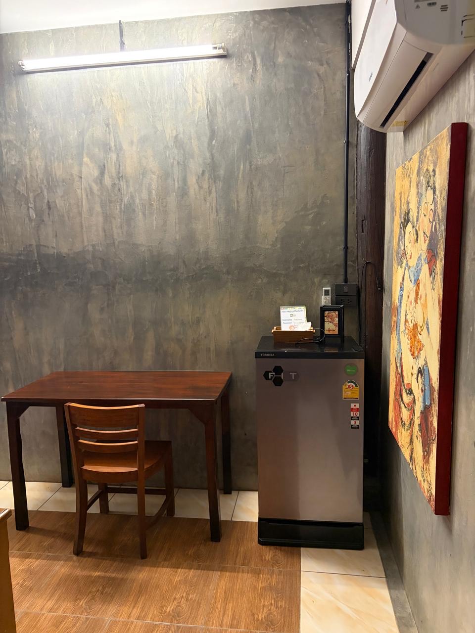 Sarapi desk fridge and painting